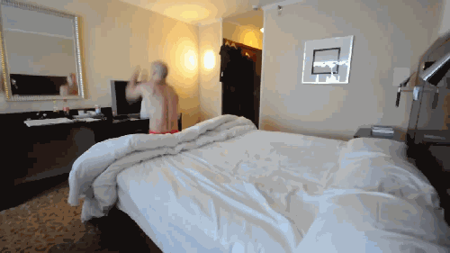 ani_flipping-into-bed.gif