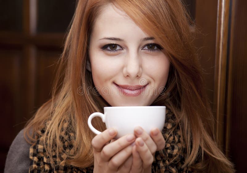 style-redhead-girl-drinking-coffee-22681113.jpg