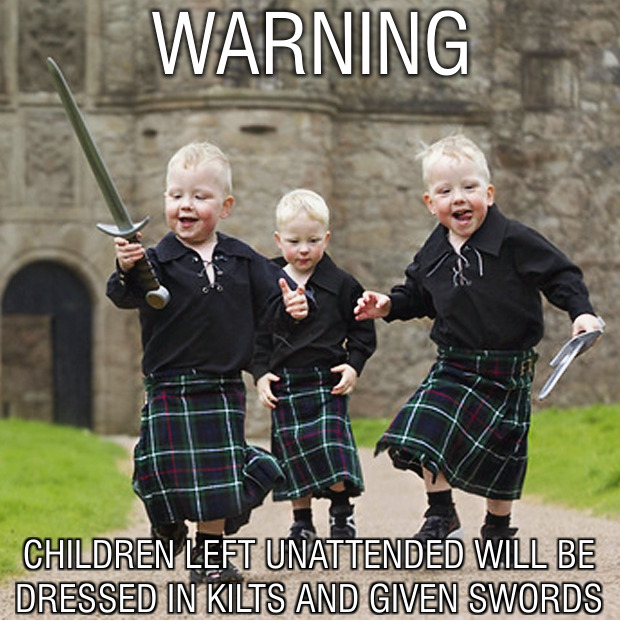 kids-given-kilts-swords.jpg