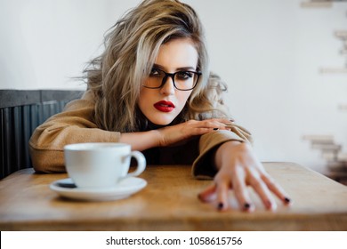 beautiful-fashion-stylish-girl-sits-260nw-1058615756.jpg