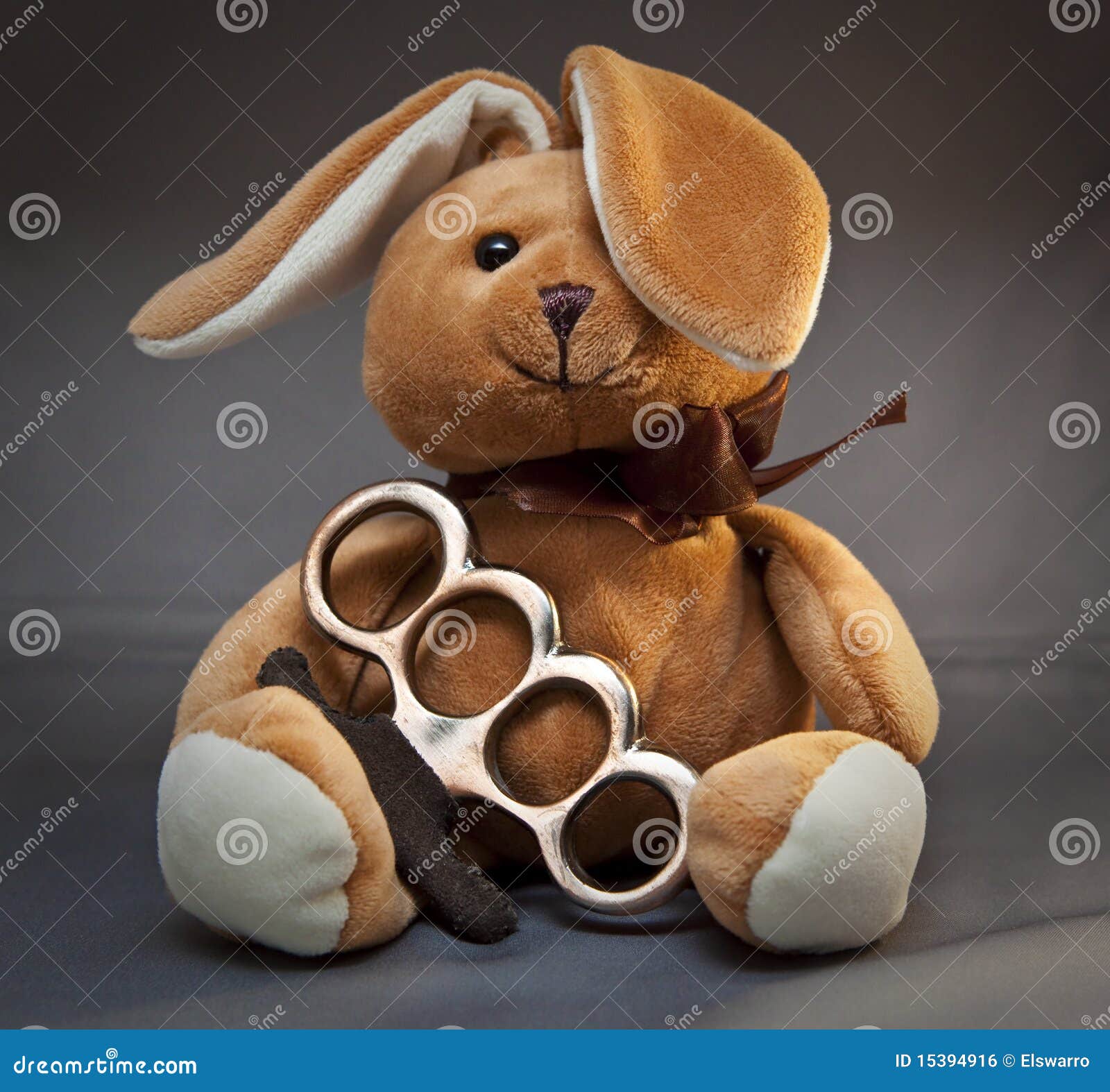 brass-knuckle-teddy-bear-15394916.jpg
