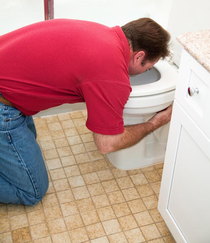 man-in-red-shirt-vomiting.jpg