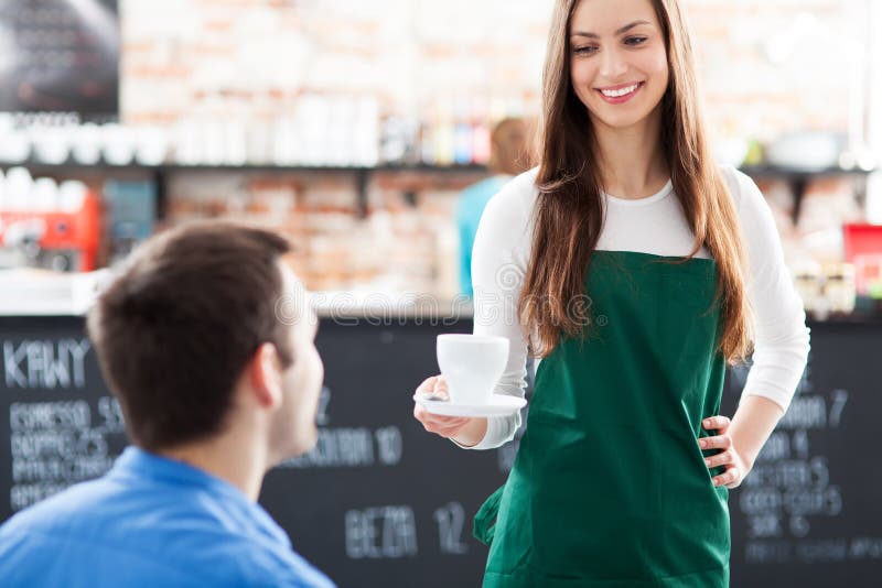 waitress-serving-men-coffee-cafe-30081452.jpg