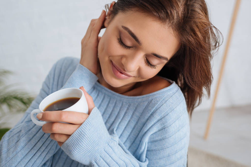 stock-photo-happy-girl-closed-eyes-holding