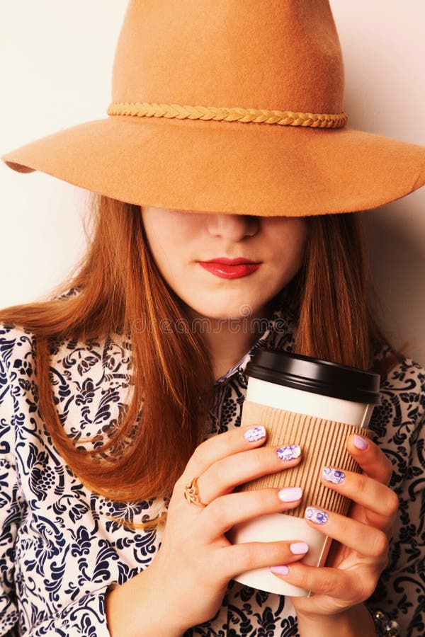 girl-cowboy-hat-coffee-break-invigorating-drink-68825287.jpg