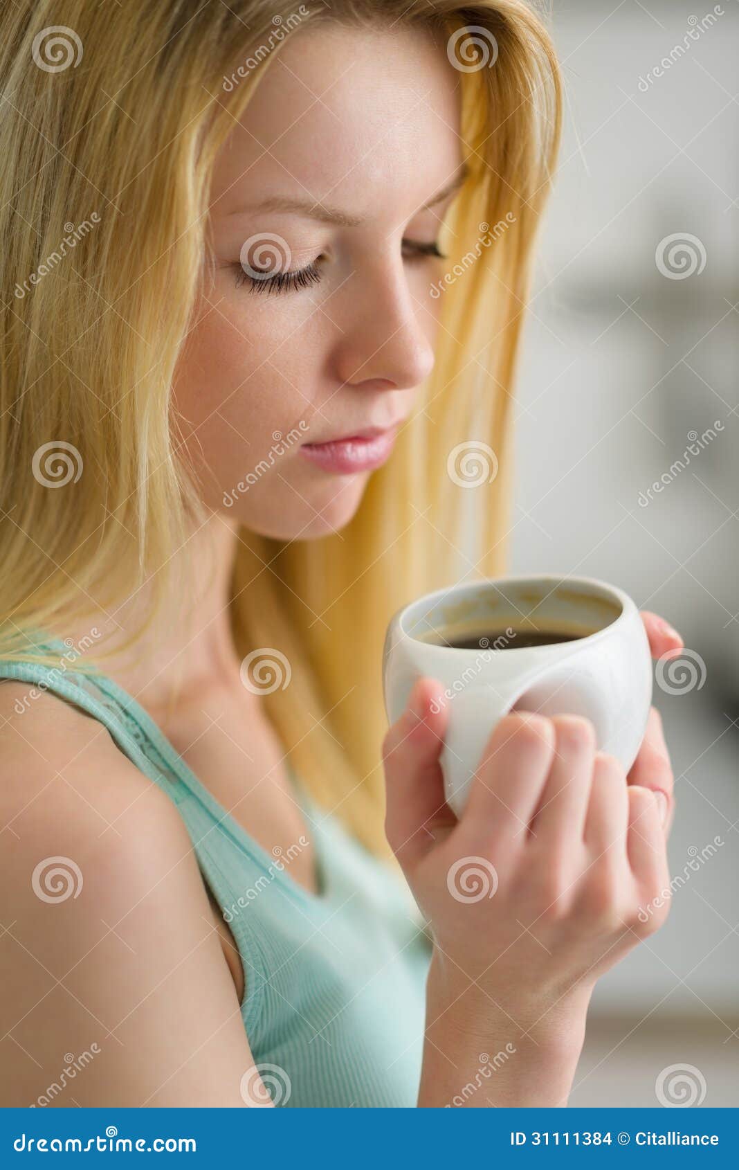 portrait-woman-drinking-coffee-morning-young-31111384.jpg