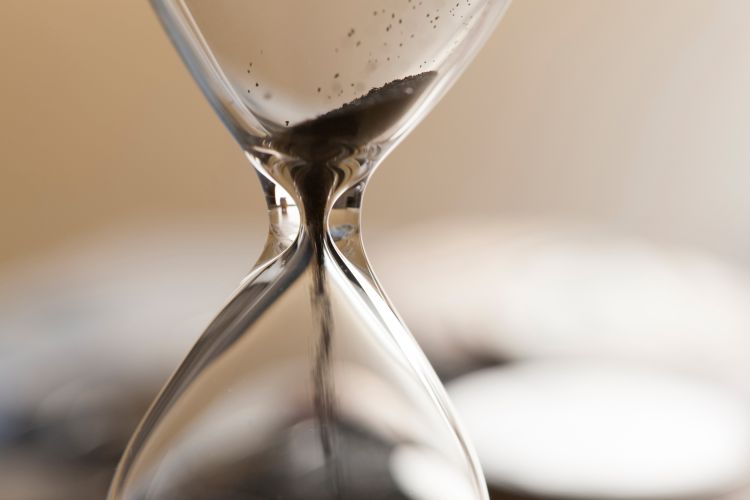 almost-empty-hourglass-dark-sand.jpg