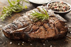 grilled-bbq-t-bone-steak-fresh-rosemary-33274100.jpg
