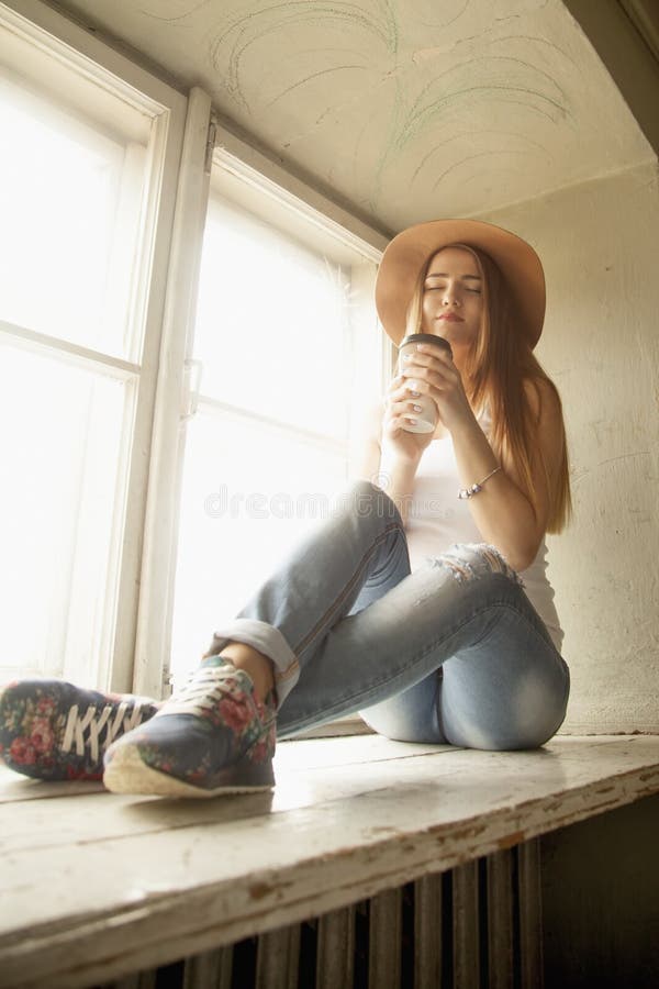 young-woman-cowboy-hat-cup-coffee-beautiful-112259514.jpg
