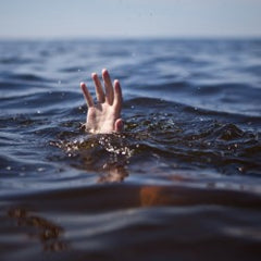 drowning_hand_small_medium.jpg