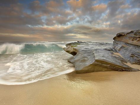 patrick-smith-large-waves-crashing-on-the-sandstone-rocks-and-sandy-beach-at-la-jolla-california-usa.jpg