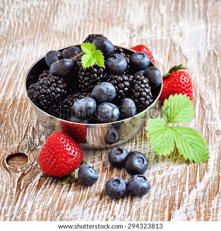 stock-photo-ripe-berries-blueberries-strawberries-blackberries-summer-harvest-fresh-vitamins-vintage-294323813.jpg