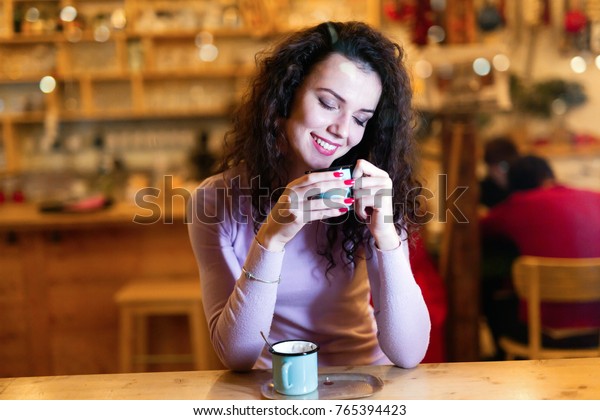 young-happy-woman-drinking-coffee-600w-765394423.jpg