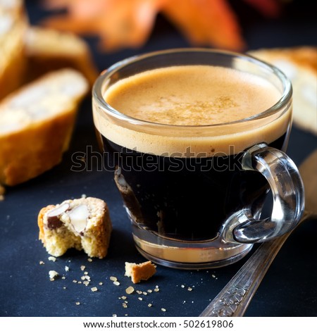 stock-photo-good-morning-concept-cup-of-espresso-coffee-with-italian-cantuccini-biscuits-and-autumn-leaves-502619806.jpg